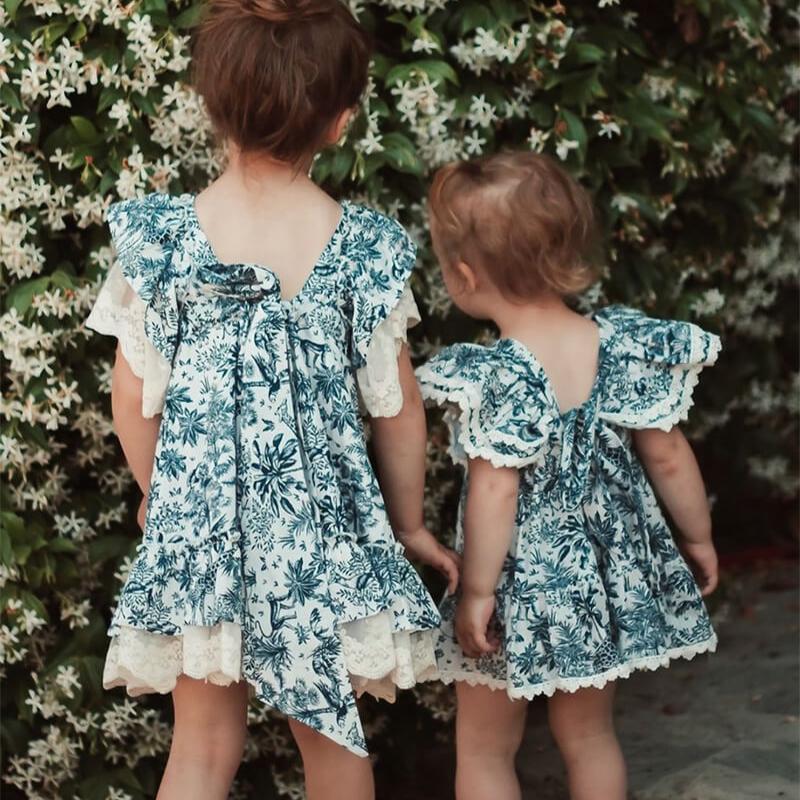 Two girls wearing Premium European dresses in toile de jouy